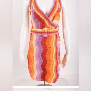 Farm Rio's minidress, colorful with a plunging V-neckline and belted waist